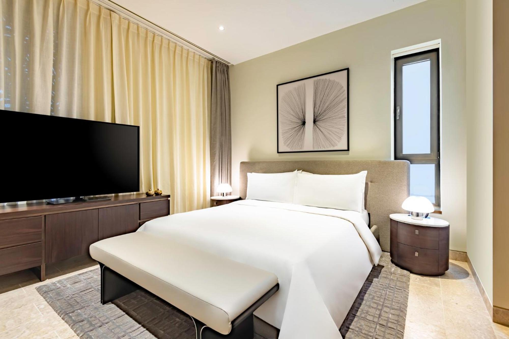 Отель Mandarin Oriental, Доха Экстерьер фото A bedroom at the hotel